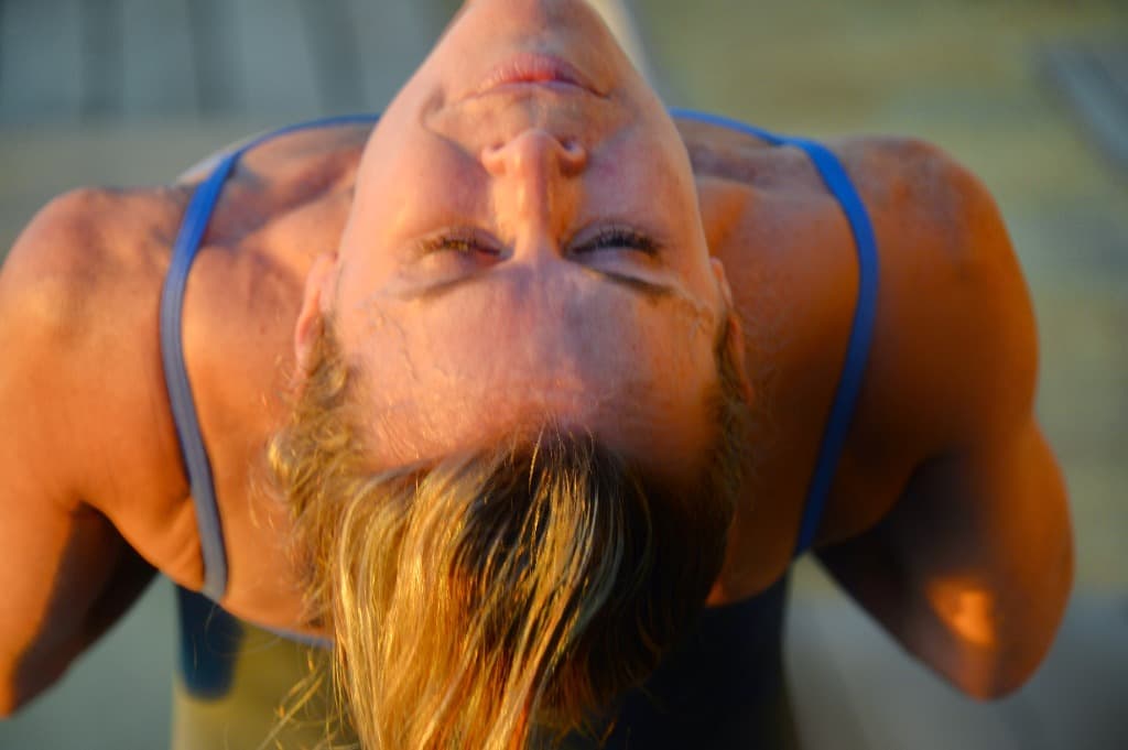 Elizabeth in a deep backbend during practice