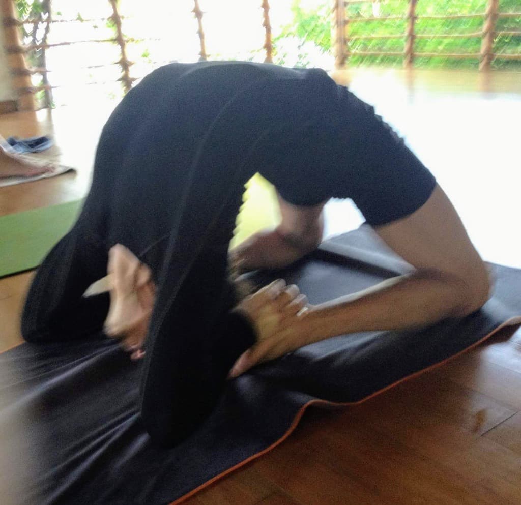 Elizabeth practicing Kapotasana - deep backbend